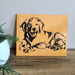 Hand made picture of dog cut on wooden plug. Signed by artist.